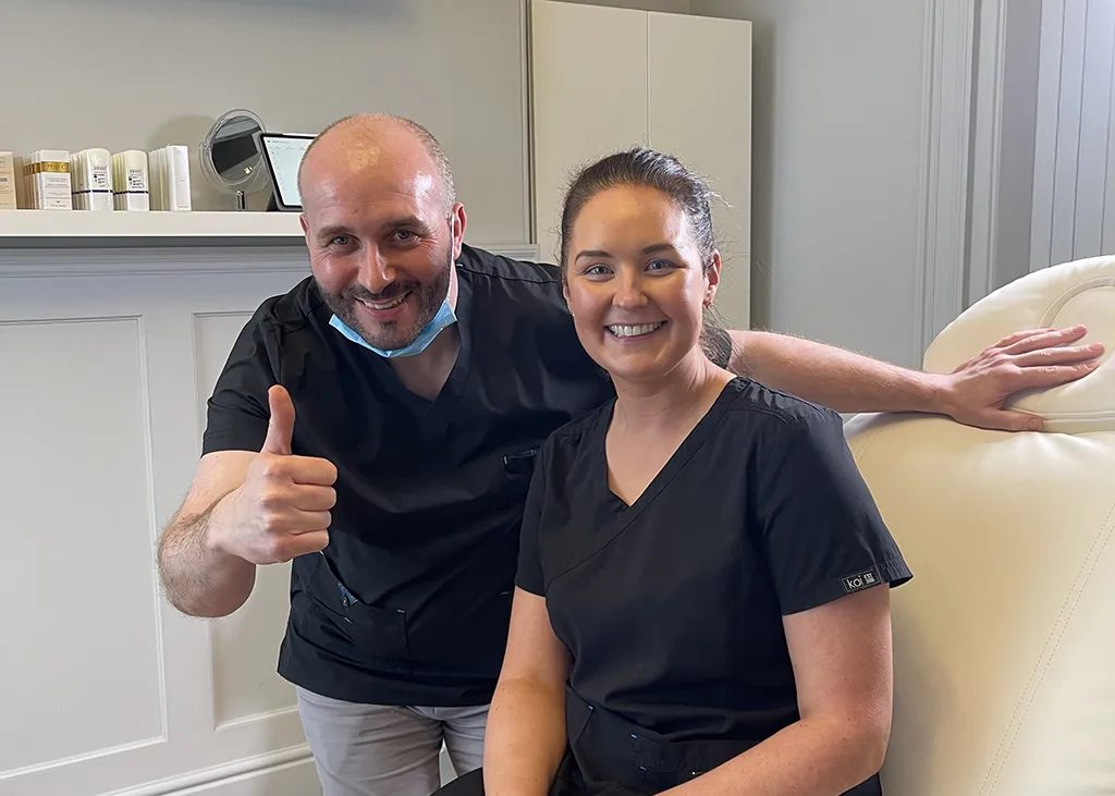 Dr Cormac Lynch with a delegate at the Dublin clinic