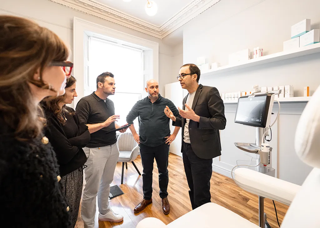 Delegates observing a live demonstration in the clinic